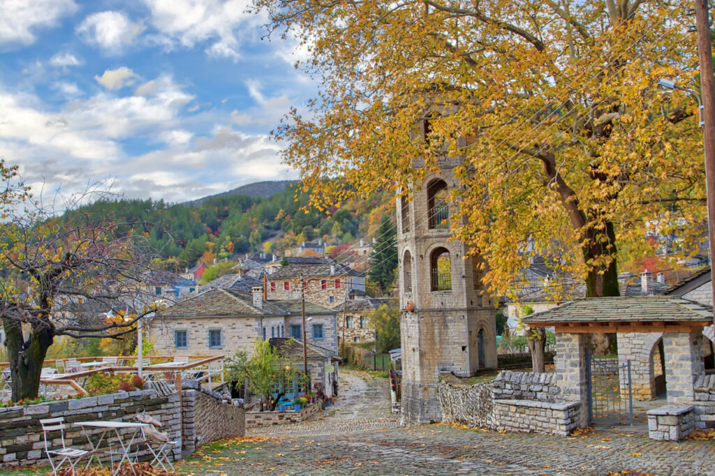 Sunset on a traditional alley in Megalo Papingo village in Ioannina, Greece