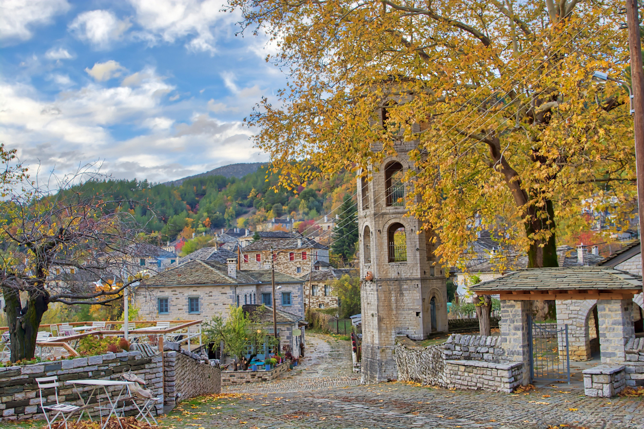 Sunset on a traditional alley in Megalo Papingo village in Ioannina, Greece