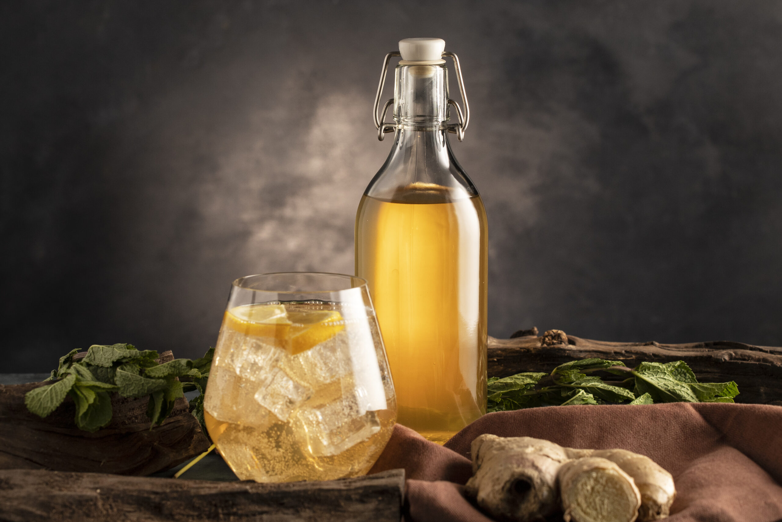 kombucha-bottle-glass-arrangement-still-life